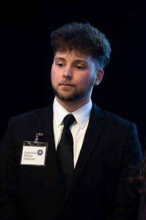 a man wearing a suit and tie